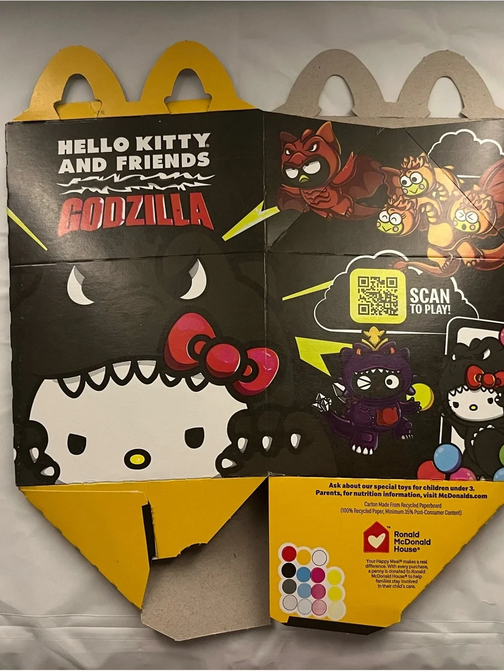 Hello Kitty Godzilla McDonald’s Happy Meal figure and box